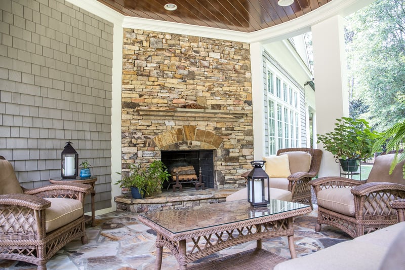 Rustic Stone Fireplace with Outdoor Seating Area